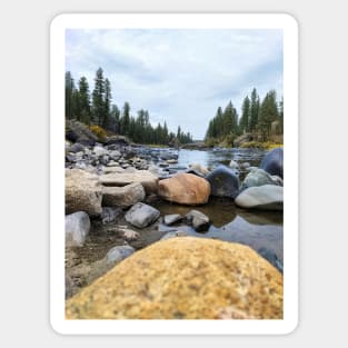 Cloudy skies on the riverside of Spokane Sticker